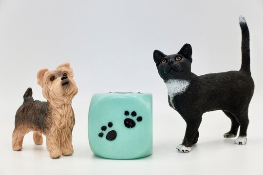 A dog and a cat miniature figurines toys