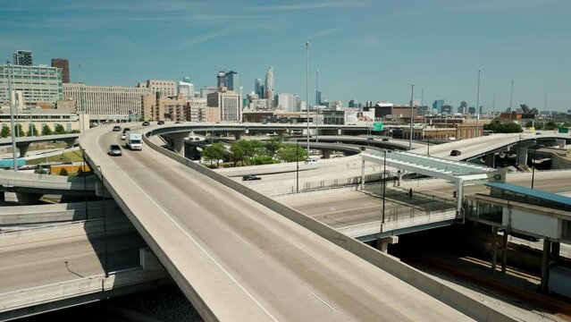 Drone shot of cars driving over elevated highway and busy interchange in Chicago. Chicago IL. USA 5 May 2023