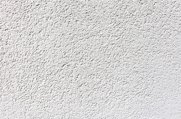 White plaster on the wall of a house as an abstract background
