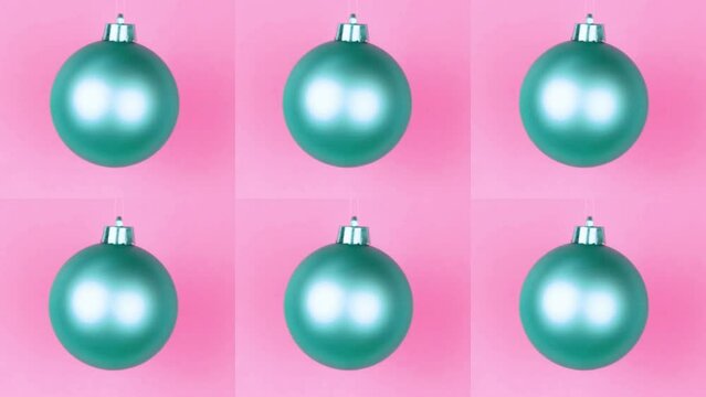Christmas ball on pink background multiplied