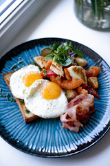 Breakfast Plate with Fried Eggs and Bacon