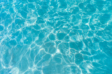 Clear blue turquoise ripple sea water surface. Pure sparkled transparent liquid natural texture...