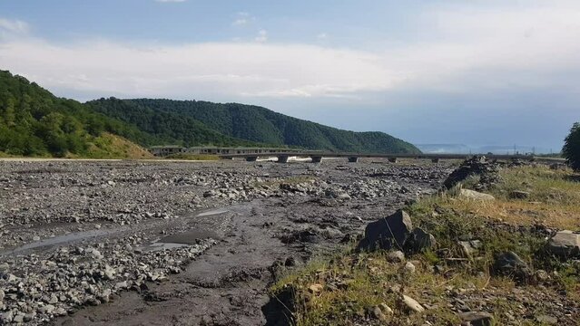 Muddy River in Pristine Countryside Landscape of Azerbaijan on Sunny Summer Day