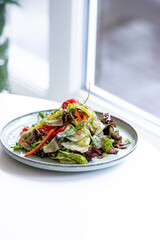 salad with vegetables on a white background