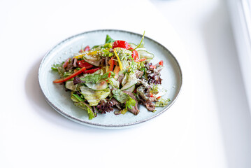salad with vegetables on a white background