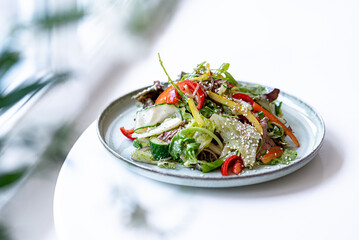 salad with vegetables on a white background