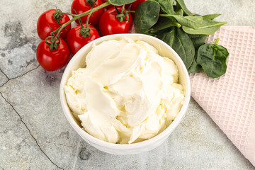 Soft cream cheese in the bowl