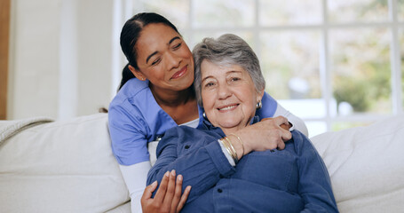 Senior woman, nurse and hug on sofa, retirement home and caregiver for support, smiling and love....