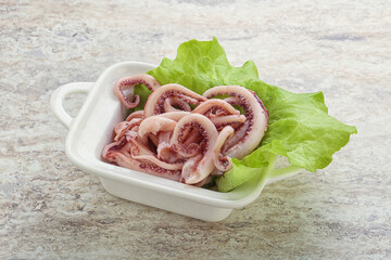 Marinated squid tentacles in the bowl