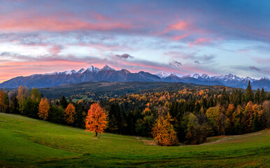 Beautiful autumn landscape in the Polish mountains. High Tatras in autumn colours at sunrise. 