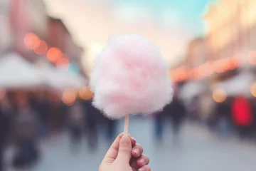 Fotobehang cotton candy on blurred christmas market background © krissikunterbunt
