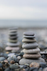 towers made of stones on the seashore