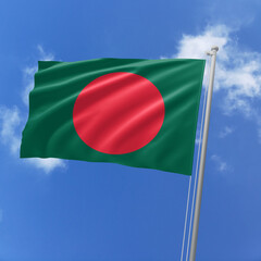 Bangladesh flag fluttering in the wind on sky.