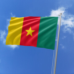 Cameroon flag fluttering in the wind on sky.