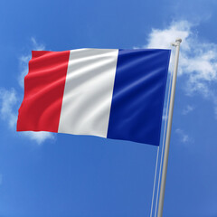 France flag fluttering in the wind on sky.