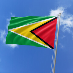 Guyana flag fluttering in the wind on sky.