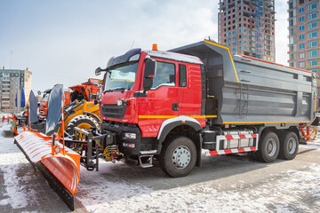 Snow removal equipment at an industrial exhibition in winter