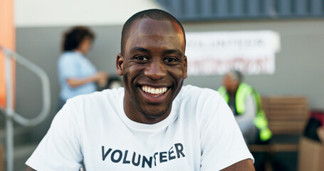 Man, volunteer and smile in portrait, charity and outreach program for society in outdoors. Happy...