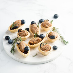 Homemade chicken liver pate with rosemary and blueberry
