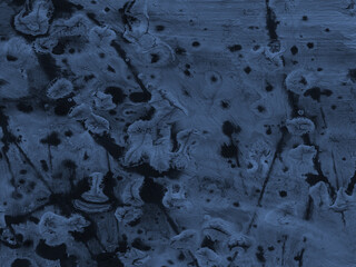 A marble-effect backdrop that is creative and artsy. watercolor abstract soft background. Wall painted blue, card made of stained paper. Modern pattern on canvas from paint stains.