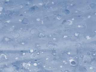 A marble-effect backdrop that is creative and artsy. watercolor abstract soft background. Wall painted blue, card made of stained paper. Modern pattern on canvas from paint stains.