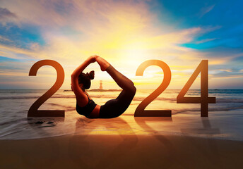 Happy new year card 2024. Silhouette of healthy girl doing Yoga Bow pose on tropical beach with sunset sky background, woman practicing yoga as a part of the Number 2024 sign. - obrazy, fototapety, plakaty