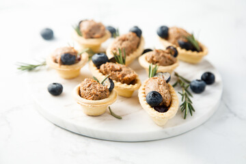 Homemade chicken liver pate with rosemary and blueberry