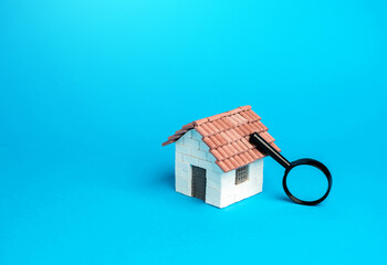House and magnifying glass. Take a mortgage. Investments in immovable assets. Property Inspection before purchase to uncover any issues. Searching for real estate to buy.
