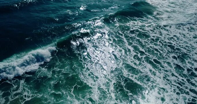 Amazing Top-down aerial view of the powerful deep blue ocean waves during the monsoon season amazing video Tropical Sea Andaman Sea : 4K Video High quality Apple ProRes