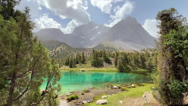 The Alaudin (Chapdara) lakes, lying at an altitude of 2800 m, are considered one of the most beautiful lakes of the Fan Mountains. Turquoise mountain lake. Pamiro-Alai. Tajikistan, Pamir 4K
