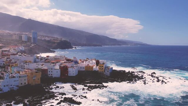 Aerial panorama with Puerto de la Cruz, Atlantic Ocean coast and beach, Tenerife, Canary island, Spain