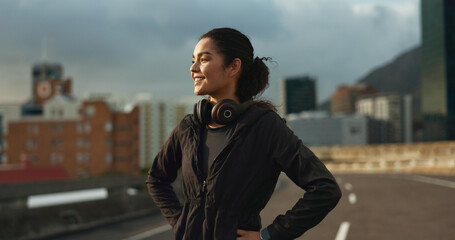 Training, city smile and outdoor woman looking at view, buildings and happy for morning cardio,...