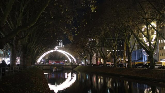 Koenigsallee or King's Avenue in Dusseldorf in winter xmas night, Night view of the famous Dusseldorf landmark, Advent season