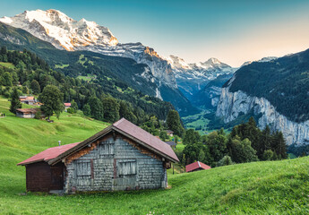 Fototapeta na wymiar Wengen village and Lauterbrunnen valley with Jungfrau mountain in the evening at Bern, Switzerland