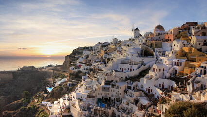 beautiful view of the sunset of Oia in Santorini (Greece) - obrazy, fototapety, plakaty