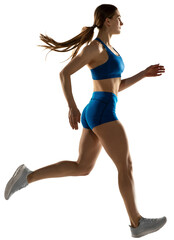 Dynamic portrait of professional female athlete, runner or jogger wearing summer sportswear...