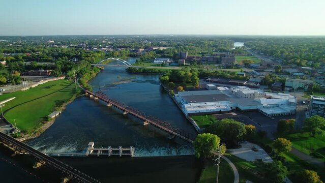 Fordham Dam Aerial in Rockford Illinois abover Rock river. Beautiful high angle shot. Green industrial city.
