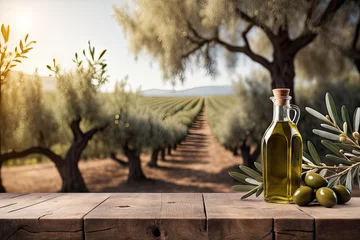 Stoff pro Meter Old wooden table for product display with natural green olive field background. Natural vintage table top perspective and blurred olive tree layout design. © HalilKorkmazer