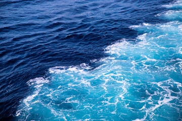 Blue ocean with white waves