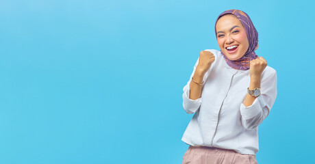 Young amazed Asian woman with successful expression
