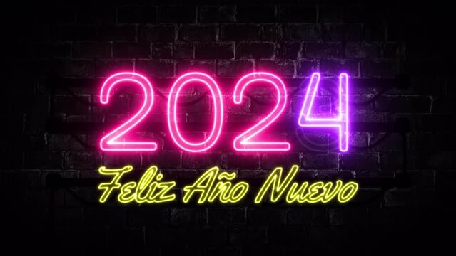 Feliz ano nuevo 2024. Happy New Year 2024. Spanish greeting. Neon letters on brick wall background. Colourful and bright blinking lights. Horizontal orientation.