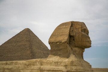 The great Sphinx of Giza in front of pyramids, Cairo, Egypt