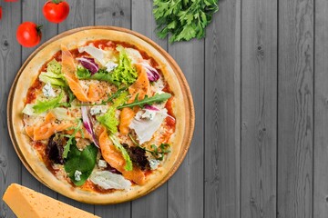 Tasty fresh pizza dish with spices,