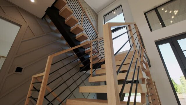 Stairs in modern home, real estate interior. Move camera wide footage