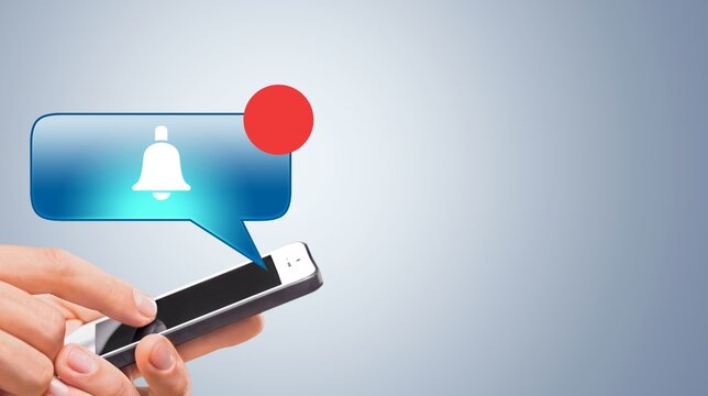 Reminder concept , a smartphone with Bell icon