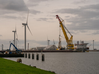 Obraz premium Factory produces windmills at seaport Eemshaven in the Netherlands