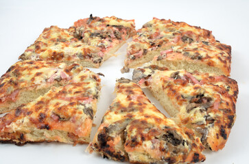 homemade juicy pizza on thick dough with lots of toppings photo on a white background