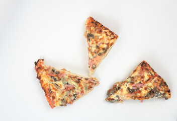 homemade juicy pizza on thick dough with lots of toppings photo on a white background