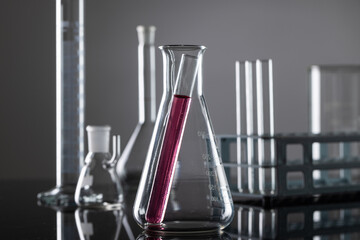 Close up of laboratory dishes and copy space on grey background