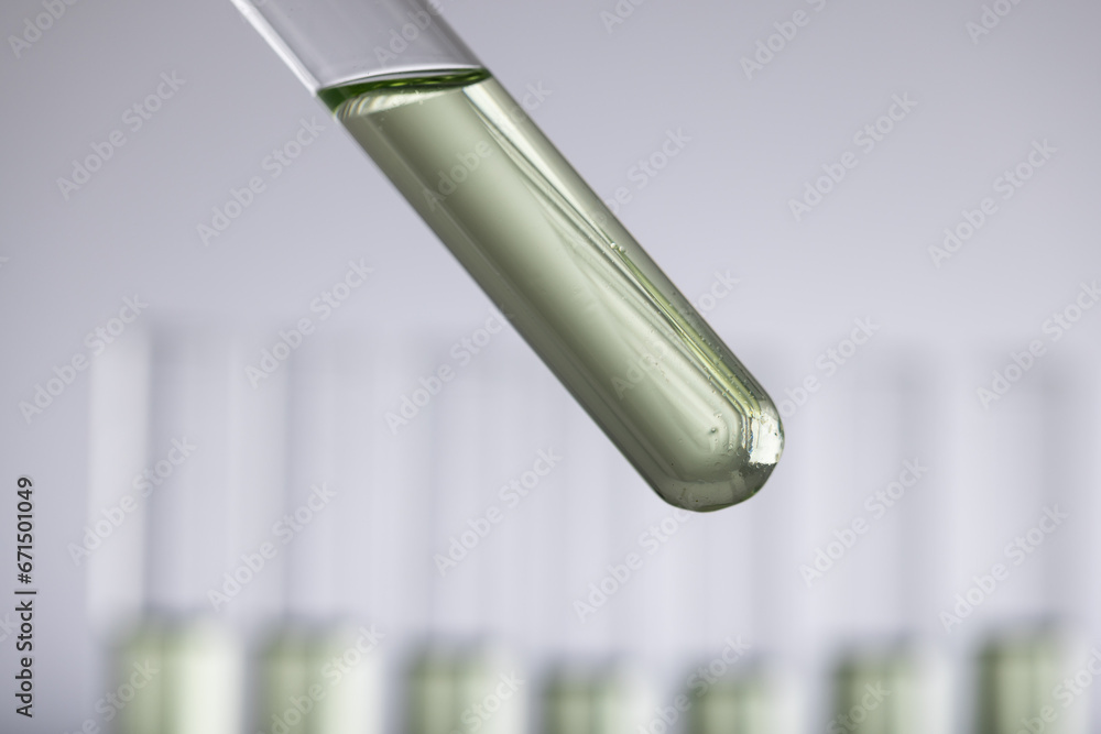 Poster close up of laboratory test tubes with copy space on grey background